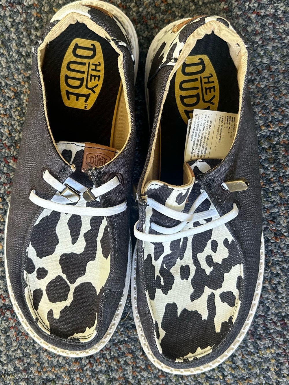Hey Dude Women's Cow-Print Canvas Moccasins in Black and White